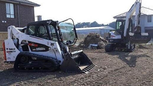 LNJ Excavation bobcat doing a site clean up